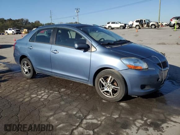 ✅ 2009 Toyota Yaris • VIN: JTDBT903791314427 • Lot: 85681395. Listed on Copart with 191,015 mi. Free auction sales archive from the USA and detailed vehicle history report at DreamBid. Image 4.
