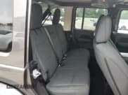 ✅ 2025 Jeep Wrangler Sahara • VIN: 1C4PJXEN0SW592086 • Лот: 59791885. Опубликован ранее на Copart с пробегом 1 124 миль. Бесплатный доступ к архиву аукционных продаж из США и подробный отчёт об истории автомобиля на DreamBid. Изображение 11.