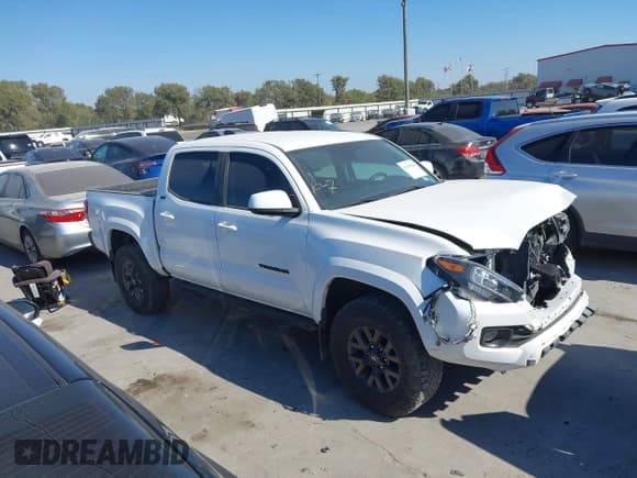 ✅ 2023 Toyota Tacoma SR5 • VIN: 3TYAZ5CN4PT042035 • Lot: 43435818. Listed on IAAI with 52,589 mi. Free auction sales archive from the USA and detailed vehicle history report at DreamBid. Image 13.