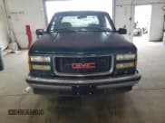 ✅ 1995 GMC Sierra 1500 • VIN: 2GTEC19K2S1558740 • Lot: 69398185. Wystawiony na Copart z przebiegiem 386 899 mil. Bezpłatny archiwum sprzedaży aukcyjnych z USA i szczegółowy raport historii pojazdu na DreamBid. Zdjęcie 5.
