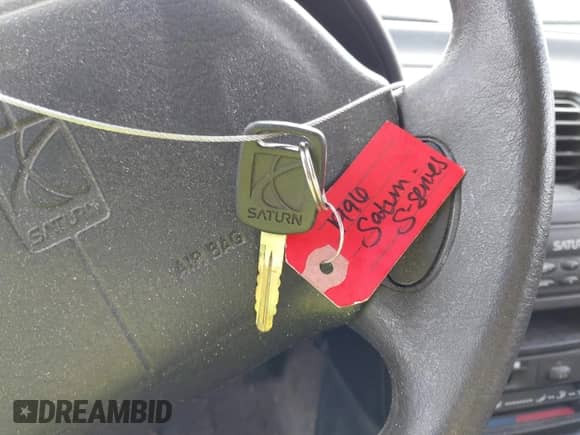 1996 Saturn SW z VIN 1G8ZJ8272TZ346249, wystawiony jako IAAI lot #43384611 z przebiegiem 182 853 mil mil oraz . Historia ofert i sprzedaży dostępna na DreamBid. Obrazek 11.