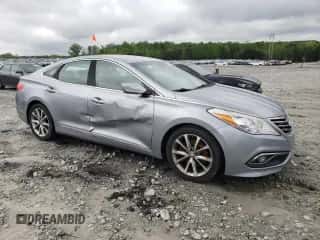 2015 Hyundai Azera z VIN KMHFG4JG1FA454362, wystawiony jako Copart lot #50897305 z przebiegiem 130 185 mil mil oraz Szkoda całkowita • Salvage title. Historia ofert i sprzedaży dostępna na DreamBid. Obrazek 4.