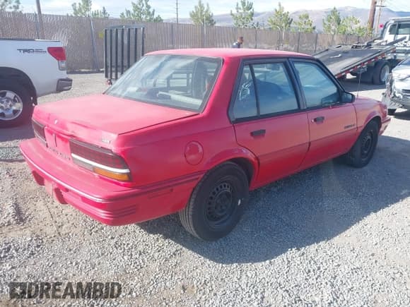 ✅ 1993 Pontiac Sunbird • VIN: 1G2JB54H5P7513942 • Lot: 43304962. Listed on IAAI with 126,707 mi. Free auction sales archive from the USA and detailed vehicle history report at DreamBid. Image 4.