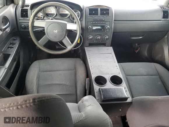 ✅ 2009 Dodge Charger Police • VIN: 2B3KA43T59H540750 • Лот: 92185095. Опубликован ранее на Copart с пробегом 190 118 миль. Бесплатный доступ к архиву аукционных продаж из США и подробный отчёт об истории автомобиля на DreamBid. Изображение 8.