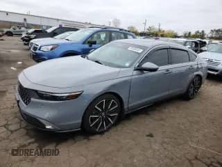 2024 Honda Accord Touring with VIN 1HGCY2F85RA045815, listed as a Copart auction lot 85090645 with 31,652 mi miles and Salvage title. Bid and sale history available at DreamBid. Image 1.