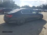 ✅ 2018 BMW 7 Series 750i • VIN: WBA7F0C51JGM23275 • Lot: 82670365. Listed on Copart with 119,782 mi. Free auction sales archive from the USA and detailed vehicle history report at DreamBid. Image 3.