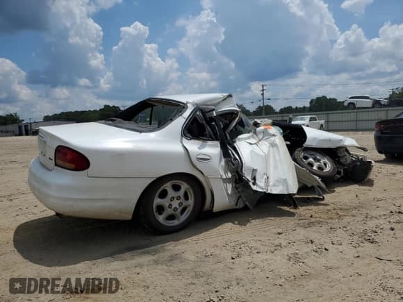 ✅ 1999 Oldsmobile Intrigue GX • VIN: 1G3WH52K7XF300995 • Lot: 66347855. Listed on Copart with Not provided. Free auction sales archive from the USA and detailed vehicle history report at DreamBid. Image 3.