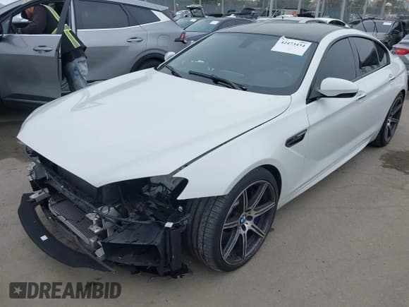 ✅ 2014 BMW M6 • VIN: WBS6C9C51ED467255 • Lot: 42473434. Listed on IAAI with 68,480 mi. Free auction sales archive from the USA and detailed vehicle history report at DreamBid. Image 2.