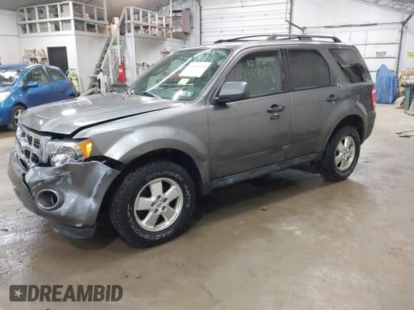 ✅ 2011 Ford Escape XLT • VIN: 1FMCU9DG7BKB21690 • Lot: 42389058. Listed on IAAI with 147,308 mi. Free auction sales archive from the USA and detailed vehicle history report at DreamBid. Image 2.