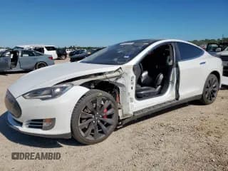 ✅ 2015 Tesla Model S 85D • VIN: 5YJSA1H48FF090026 • Лот: 85408855. Опубликован ранее на Copart с пробегом 78 942 миль. Бесплатный доступ к архиву аукционных продаж из США и подробный отчёт об истории автомобиля на DreamBid. Изображение 1.