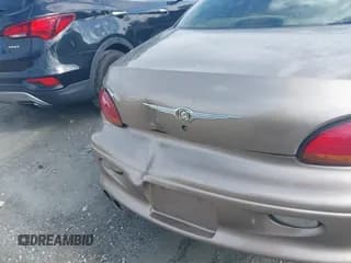 ✅ 2001 Chrysler LHS • VIN: 2C3HC56GX1H514869 • Lot: 42241341. Listed on IAAI with 194,269 mi. Free auction sales archive from the USA and detailed vehicle history report at DreamBid. Image 6.