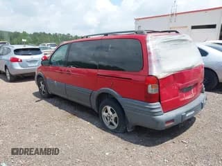 ✅ 1999 Pontiac Montana • VIN: 1GMDX03E6XD186081 • Lot: 42105419. Wystawiony na IAAI z przebiegiem 249 120 mil. Bezpłatny archiwum sprzedaży aukcyjnych z USA i szczegółowy raport historii pojazdu na DreamBid. Zdjęcie 3.