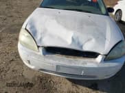 ✅ 2006 Ford Taurus SE • VIN: 1FAFP53UX6A139742 • Lot: 43701399. Listed on IAAI with 252,993 mi. Free auction sales archive from the USA and detailed vehicle history report at DreamBid. Image 6.