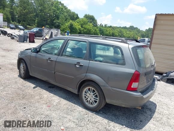 ✅ 2003 Ford Focus SE Fleet • VIN: 1FAFP36313W334084 • Lot: 42623903. Listed on IAAI with 113,182 mi. Free auction sales archive from the USA and detailed vehicle history report at DreamBid. Image 3.