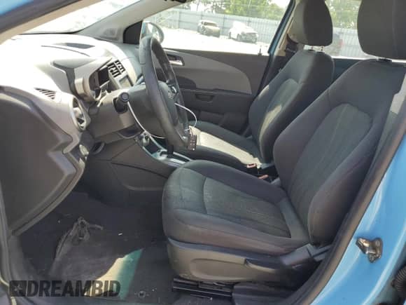 2014 Chevrolet Sonic LT с VIN 1G1JC5SH2E4163947, выставлен на аукционе Copart как лот 64984734 с пробегом Не указан миль и Списание • Salvage title. История ставок и продаж доступна на DreamBid. Изображение 7.