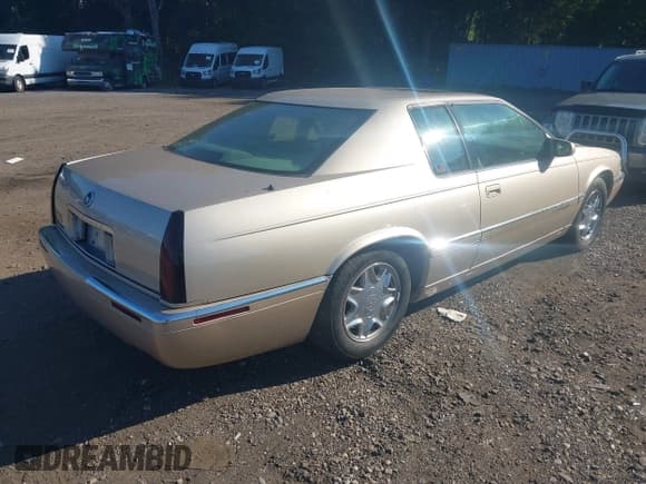 ✅ 1997 Cadillac Eldorado • VIN: 1G6EL12Y4VU602876 • Lot: 43239613. Listed on IAAI with 79,117 mi. Free auction sales archive from the USA and detailed vehicle history report at DreamBid. Image 4.