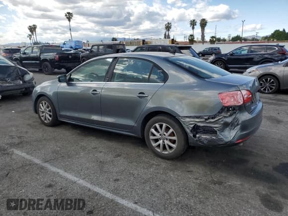 ✅ 2013 Volkswagen Jetta SE • VIN: 3VWDP7AJ8DM360372 • Lot: 51796725. Listed on Copart with 66,981 mi. Free auction sales archive from the USA and detailed vehicle history report at DreamBid. Image 2.