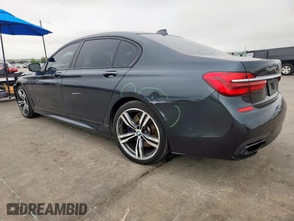 ✅ 2017 BMW 7 Series 740i • VIN: WBA7E2C34HG740975 • Lot: 71019405. Listed on Copart with 90,805 mi. Free auction sales archive from the USA and detailed vehicle history report at DreamBid. Image 2.