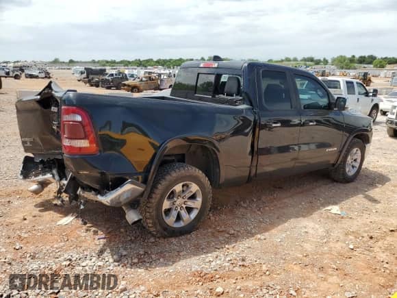 2020 Ram 1500 Laramie with VIN 1C6RREDT0LN265191, listed as a Copart auction lot 57207775 with 124,269 mi miles and Salvage title. Bid and sale history available at DreamBid. Image 3.