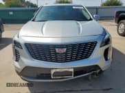 ✅ 2021 Cadillac XT4 FWD Premium Luxury • VIN: 1GYFZCR42MF060933 • Lot: 63623955. Wystawiony na Copart z przebiegiem 24 169 mil. Bezpłatny archiwum sprzedaży aukcyjnych z USA i szczegółowy raport historii pojazdu na DreamBid. Zdjęcie 5.