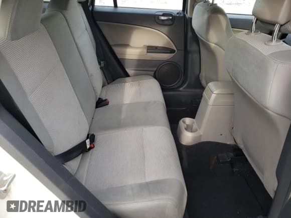 ✅ 2010 Dodge Caliber Mainstreet • VIN: 1B3CB3HA9AD616636 • Лот: 76910894. Опубликован ранее на Copart с пробегом 80 968 миль. Бесплатный доступ к архиву аукционных продаж из США и подробный отчёт об истории автомобиля на DreamBid. Изображение 10.