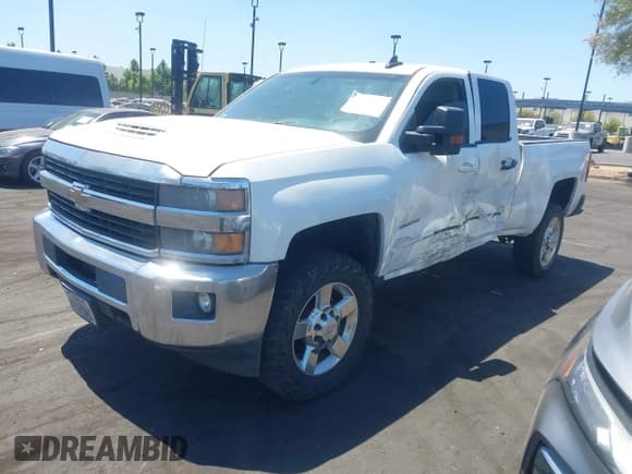 ✅ 2015 Chevrolet Silverado 2500HD LT • VIN: 1GC2CVE87FZ500852 • Lot: 43023197. Listed on IAAI with 214,790 mi. Free auction sales archive from the USA and detailed vehicle history report at DreamBid. Image 2.