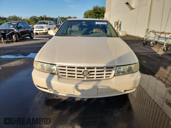 ✅ 2003 Cadillac Seville Touring STS • VIN: 1G6KY54973U208920 • Lot: 92802255. Wystawiony na Copart z przebiegiem 274 567 mil. Bezpłatny archiwum sprzedaży aukcyjnych z USA i szczegółowy raport historii pojazdu na DreamBid. Zdjęcie 5.