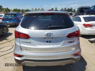 ✅ 2017 Hyundai Santa Fe Ultimate • VIN: 5XYZWDLA1HG411222 • Лот: 57331574. Опубликован ранее на Copart с пробегом 98 193 миль. Бесплатный доступ к архиву аукционных продаж из США и подробный отчёт об истории автомобиля на DreamBid. Изображение 6.