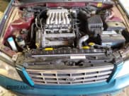 ✅ 2002 Kia Optima LX • VIN: KNAGD128925099335 • Lot: 44184335. Listed on Copart with 112,973 mi. Free auction sales archive from the USA and detailed vehicle history report at DreamBid. Image 11.