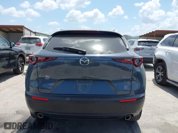 ✅ 2024 Mazda CX-30 S Carbon Edition • VIN: 3MVDMBCM4RM651155 • Lot: 42529864. Wystawiony na IAAI z przebiegiem 36 557 mil. Bezpłatny archiwum sprzedaży aukcyjnych z USA i szczegółowy raport historii pojazdu na DreamBid. Zdjęcie 17.