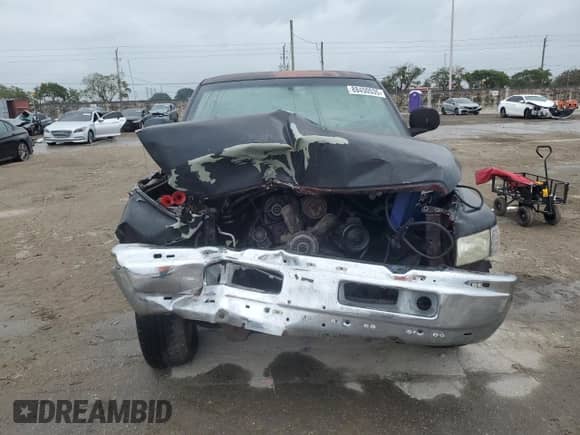 2001 Dodge 1500 с VIN 3B7HC13Y71G785485, выставлен на аукционе Copart как лот 88450535 с пробегом 276 525 миль миль и Списание • Salvage title. История ставок и продаж доступна на DreamBid. Изображение 5.