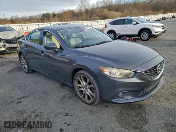 ✅ 2014 Mazda 6 i Grand Touring • VIN: JM1GJ1W60E1132237 • Lot: 94500785. Wystawiony na Copart z przebiegiem 153 960 mil. Bezpłatny archiwum sprzedaży aukcyjnych z USA i szczegółowy raport historii pojazdu na DreamBid. Zdjęcie 4.