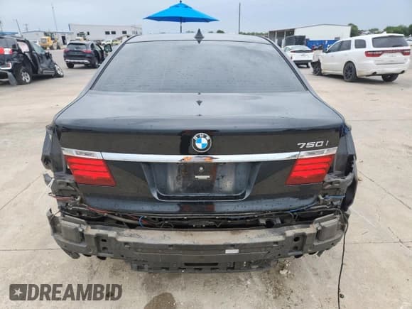 ✅ 2015 BMW 7 Series 750i • VIN: WBAYA8C54FG197788 • Lot: 63431285. Listed on Copart with 114,581 mi. Free auction sales archive from the USA and detailed vehicle history report at DreamBid. Image 6.