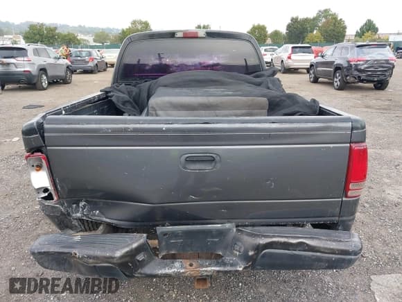 ✅ 2004 Dodge Dakota Sport • VIN: 1D7HL38K34S757492 • Lot: 43385454. Wystawiony na IAAI z przebiegiem Nie podano. Bezpłatny archiwum sprzedaży aukcyjnych z USA i szczegółowy raport historii pojazdu na DreamBid. Zdjęcie 16.