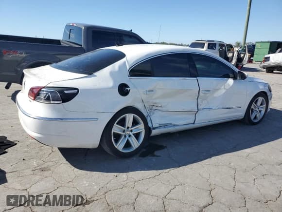 ✅ 2013 Volkswagen CC R-Line • VIN: WVWBP7AN8DE555178 • Lot: 82399615. Listed on Copart with 70,888 mi. Free auction sales archive from the USA and detailed vehicle history report at DreamBid. Image 3.