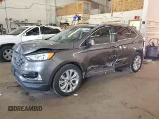 ✅ 2022 Ford Edge Titanium • VIN: 2FMPK4K99NBA01323 • Lot: 80844085. Listed on Copart with 82,558 mi. Free auction sales archive from the USA and detailed vehicle history report at DreamBid. Image 1.