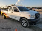 ✅ 2012 Toyota Tundra SR • VIN: 5TFTY5F12CX007367 • Lot: 79122864. Listed on Copart with 162,623 mi. Free auction sales archive from the USA and detailed vehicle history report at DreamBid. Image 4.
