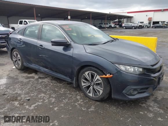✅ 2017 Honda Civic EX-T • VIN: 2HGFC1F31HH639991 • Lot: 43724277. Listed on IAAI with 69,611 mi. Free auction sales archive from the USA and detailed vehicle history report at DreamBid. Image 1.