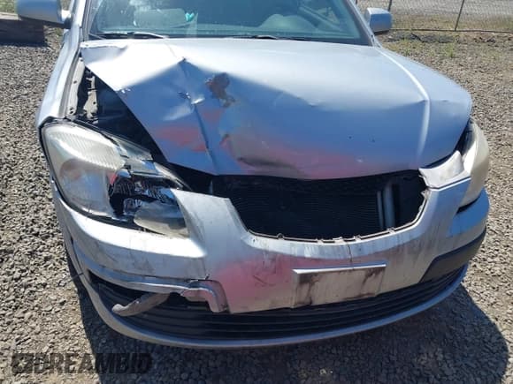 ✅ 2009 Kia Rio LX • VIN: KNADE223X96495868 • Lot: 42419238. Wystawiony na IAAI z przebiegiem 197 989 mil. Bezpłatny archiwum sprzedaży aukcyjnych z USA i szczegółowy raport historii pojazdu na DreamBid. Zdjęcie 6.