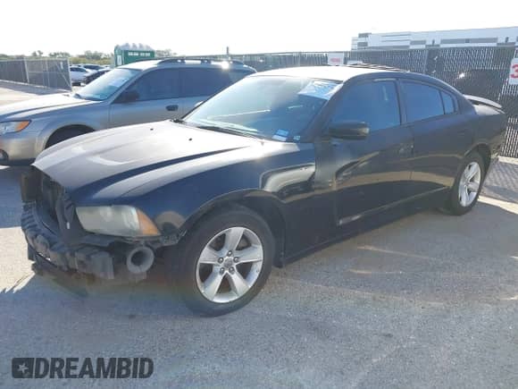 ✅ 2012 Dodge Charger SE • VIN: 2C3CDXBG1CH102593 • Lot: 43583549. Listed on IAAI with 166,100 mi. Free auction sales archive from the USA and detailed vehicle history report at DreamBid. Image 2.