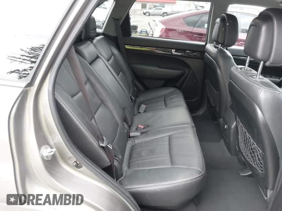 ✅ 2012 Kia Sorento SX • VIN: 5XYKWDA28CG281834 • Lot: 42596832. Listed on IAAI with 140,233 mi. Free auction sales archive from the USA and detailed vehicle history report at DreamBid. Image 8.
