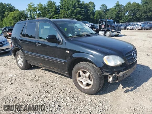 ✅ 2001 Mercedes-Benz M 320/430/500 • VIN: 4JGAB54E21A276155 • Lot: 67730145. Listed on Copart with 186,836 mi. Free auction sales archive from the USA and detailed vehicle history report at DreamBid. Image 4.