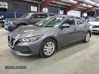 ✅ 2021 Nissan Sentra S • VIN: 3N1AB8BV7MY285462 • Лот: 90395945. Опубликован ранее на Copart с пробегом 92 901 миль. Бесплатный доступ к архиву аукционных продаж из США и подробный отчёт об истории автомобиля на DreamBid. Изображение 1.