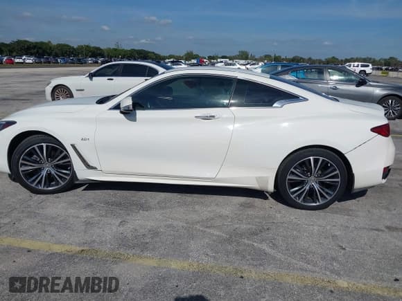 ✅ 2017 Infiniti Q60 2.0t • VIN: JN1CV7EK0HM110958 • Lot: 43858400. Listed on IAAI with 93,353 mi. Free auction sales archive from the USA and detailed vehicle history report at DreamBid. Image 14.