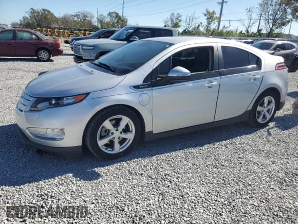 ✅ 2014 Chevrolet Volt • VIN: 1G1RB6E4XEU165160 • Lot: 82128154. Listed on Copart with 37,295 mi. Free auction sales archive from the USA and detailed vehicle history report at DreamBid. Image 1.