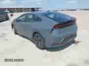 2024 Toyota Prius LE with VIN JTDACAAUXR3032131, listed as a IAAI auction lot 43231631 with 15,535 mi miles and . Bid and sale history available at DreamBid. Image 3.