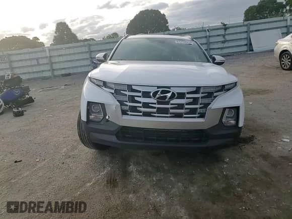 2022 Hyundai Santa Cruz SEL с VIN 5NTJC4AE3NH017822, выставлен на аукционе Copart как лот 81253684 с пробегом 25 955 миль миль и На запчасти • Non repairable. История ставок и продаж доступна на DreamBid. Изображение 12.