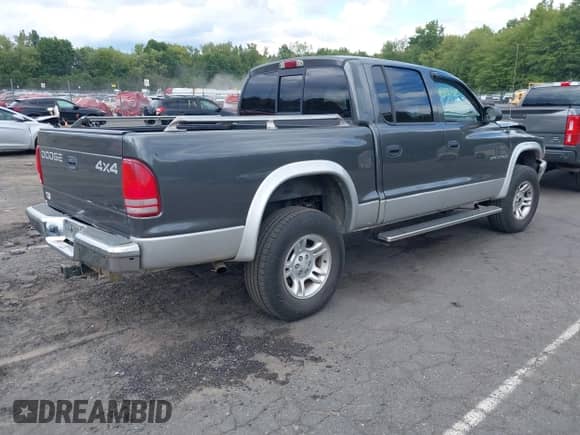 2002 Dodge Dakota SLT с VIN 1B7HG48N02S519241, выставлен на аукционе IAAI как лот 43121163 с пробегом 102 842 миль миль и . История ставок и продаж доступна на DreamBid. Изображение 4.