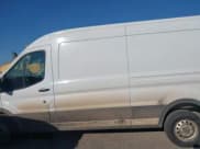 ✅ 2023 Ford Transit Cargo • VIN: 1FTBR2C81PKB38124 • Lot: 43209787. Listed on IAAI with 55,552 mi. Free auction sales archive from the USA and detailed vehicle history report at DreamBid. Image 13.
