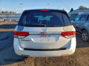 ✅ 2014 Honda Odyssey EX-L • VIN: 5FNRL5H66EB092230 • Лот: 93708515. Опубликован ранее на Copart с пробегом 147 737 миль. Бесплатный доступ к архиву аукционных продаж из США и подробный отчёт об истории автомобиля на DreamBid. Изображение 6.